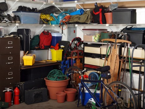 Mini, midi, and large skips lined up for a residential project